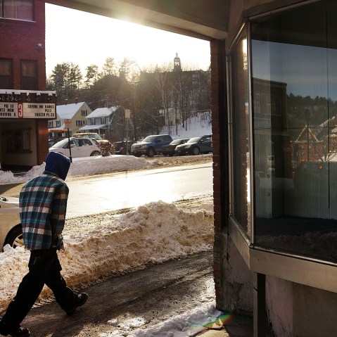 A man walks down a street in St. Johnsbury, a town which has a high rate of heroin users, on Feb. 6, 2014 in St. Johnsbury, Vermont.
