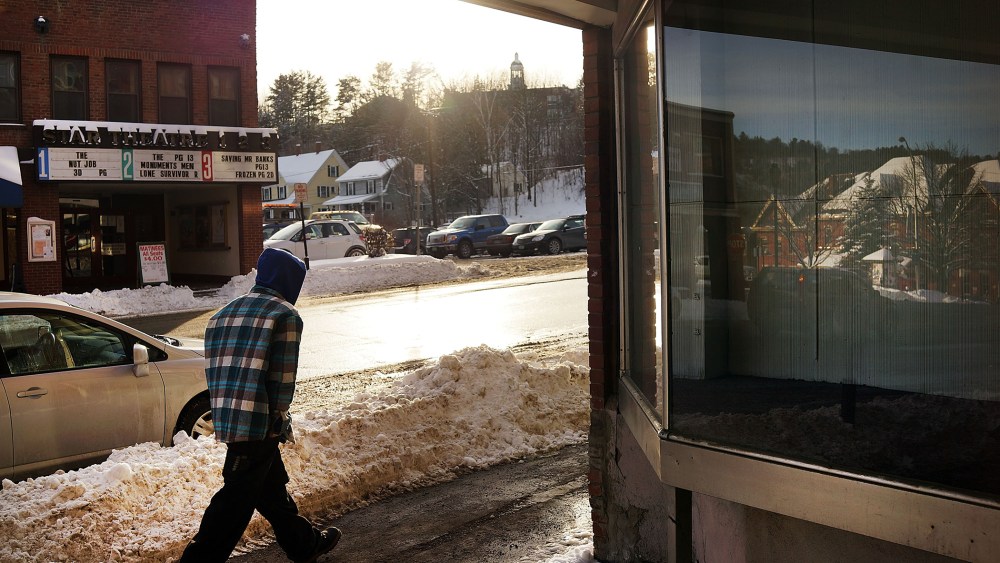 A man walks down a street in St. Johnsbury, a town which has a high rate of heroin users, on Feb. 6, 2014 in St. Johnsbury, Vermont.