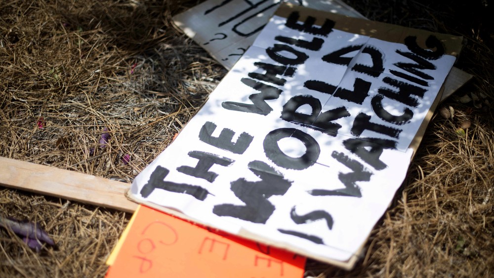 Placards litters the ground after protesters gathered outside the North Charleston City Hall in North Charleston, SC on April 8, 2015. (Photo by Jim Watson/AFP/Getty)
