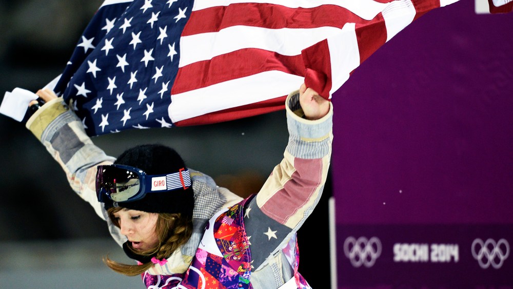 Gold Medallist, US Kaitlyn Farrington, celebrates at the end of the Women's Snowboard Halfpipe Final, Feb. 12, 2014.