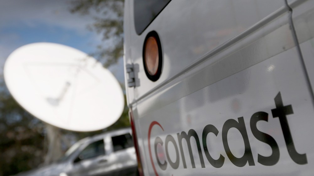 A Comcast truck is seen parked at one of their centers on Feb. 13, 2014 in Pompano Beach, Fla. (Photo by Joe Raedle/Getty)