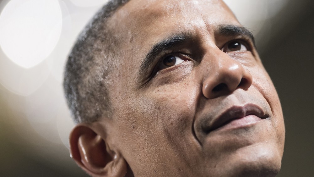 US President Barack Obama pauses while speaking during the Democratic Issues Conference in Cambridge, Maryland, Feb. 2014.