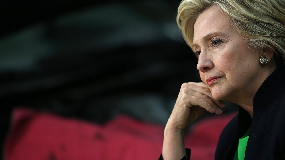 Democratic presidential hopeful and former Secretary of State Hillary Clinton looks on during a roundtable discussion with students and educators on April 14, 2015 in Monticello, Iowa. (Photo by Justin Sullivan/Getty)