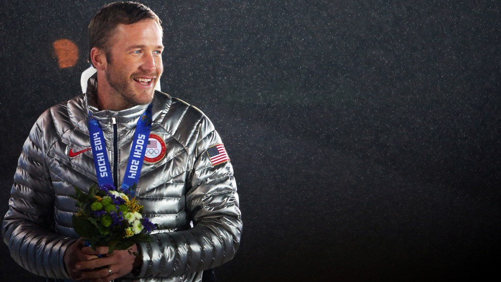Joint bronze medalist Bode Miller of the United States celebrates on the podium, Feb. 16, 2014.