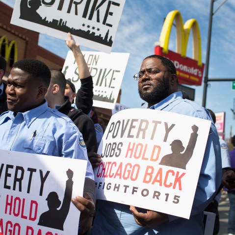 Demonstrators gather in front of a McDonald's restaurant to call for an increase in minimum wage on April 15, 2015 in Chicago, Ill. (Photo by Scott Olson/Getty)
