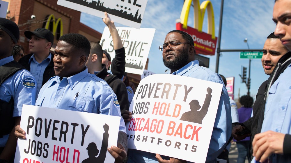 Demonstrators gather in front of a McDonald's restaurant to call for an increase in minimum wage on April 15, 2015 in Chicago, Ill. (Photo by Scott Olson/Getty)