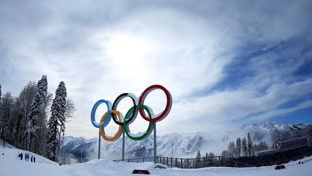 Mist rises behind the Olympic Rings during day 12 of the Sochi 2014 Winter Olympics on Feb. 19, 2014 in Sochi, Russia. (Photo by Julian Finney/Getty)