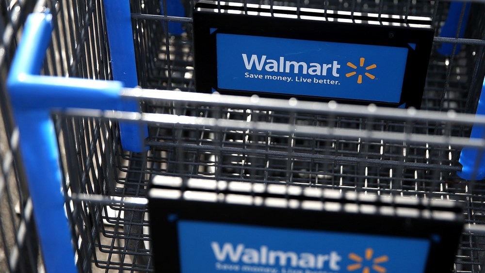 Wal-Mart shopping carts sit outside of a store. (Photo by Justin Sullivan/Getty)