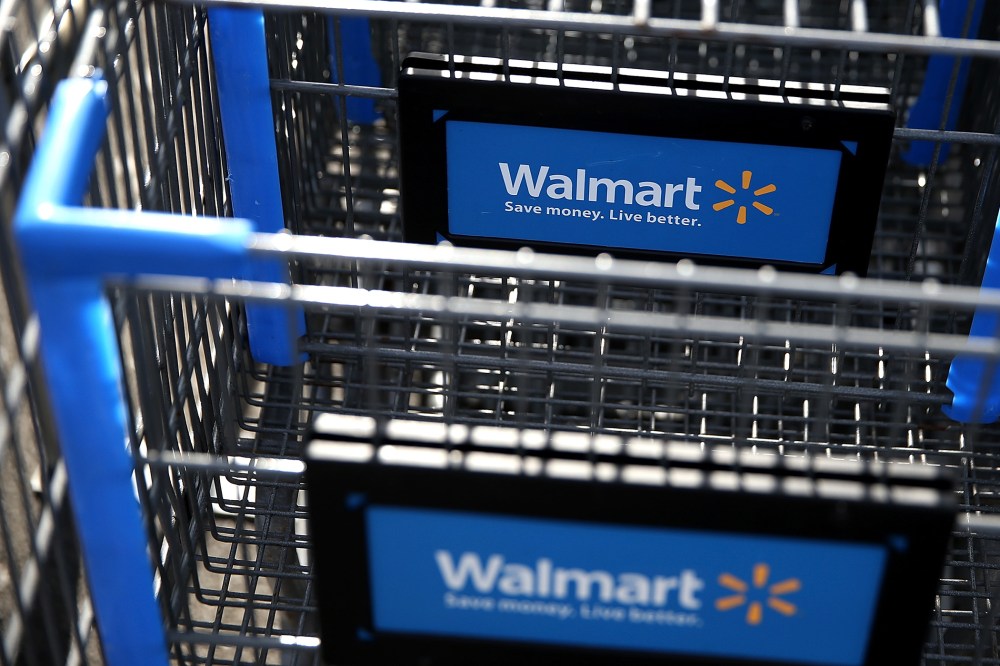 Wal-Mart shopping carts sit outside of a store. (Photo by Justin Sullivan/Getty)