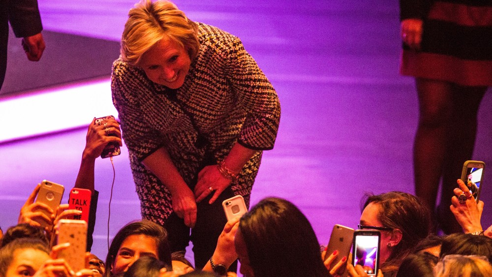 Democratic presidential hopeful and former Secretary of State Hillary Clinton poses for a photo with supporters after addressing the Women in the World Conference on April 23, 2015 in New York, N.Y. (Photo by Andrew Burton/Getty)