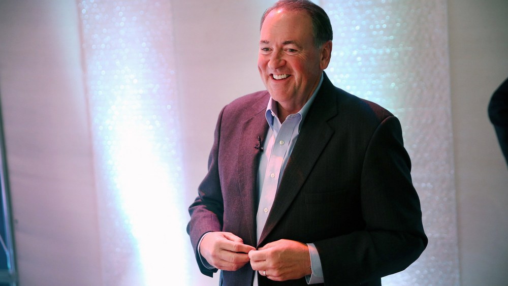 Former Arkansas Governor Mike Huckabee prepares to speak to guests gathered at the Point of Grace Church for the Iowa Faith and Freedom Coalition 2015 Spring Kickoff on April 25, 2015 in Waukee, Iowa. (Photo by Scott Olson/Getty)