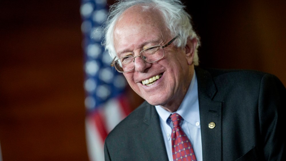 Senator Bernie Sanders, an Independent from Vermont, smiles while responding to a question during a news conference on Capitol Hill in Washington, DC, April 29, 2015. (Photo by Andrew Harrer/Bloomberg/Getty)