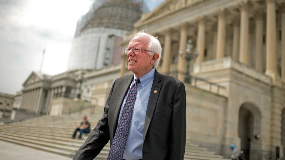 Presidential candidate Sen. Bernie Sanders, I-Vt., makes his way a news conference at the Senate swamp to speak about his agenda for the country, April 30, 2015. (Photo By Tom Williams/CQ Roll Call/Getty)