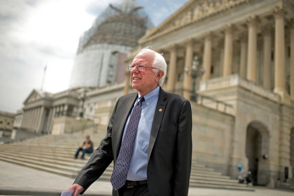 Presidential candidate Sen. Bernie Sanders, I-Vt., makes his way a news conference at the Senate swamp to speak about his agenda for the country, April 30, 2015. (Photo By Tom Williams/CQ Roll Call/Getty)