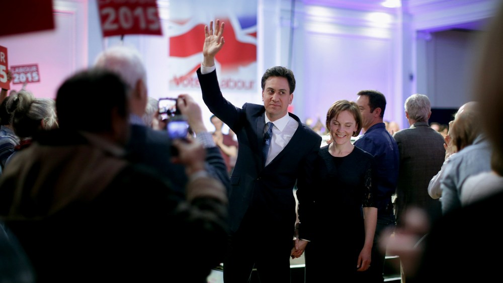 Labour leader Ed Miliband waves goodbye to supporters as he and his wife Justine Thornton leave a campaign rally at the Royal Horticultural Halls on May 2, 2015 in London, United Kingdom. (Photo by Chip Somodevilla/Getty)
