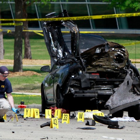 Members of the FBI Evidence Response Team investigate the crime scene outside of the Curtis Culwell Center after a shooting occurred the day before, on May 04, 2015 in Garland, Texas. (Photo by Ben Torres/Getty)