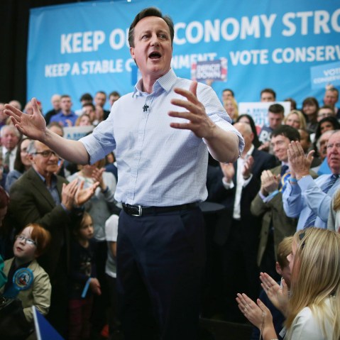 Prime Minister David Cameron addresses his campaign rally for the General Election at the Harris & Hetherington Livestock Mart on May 6, 2015 in Carlisle, United Kingdom.