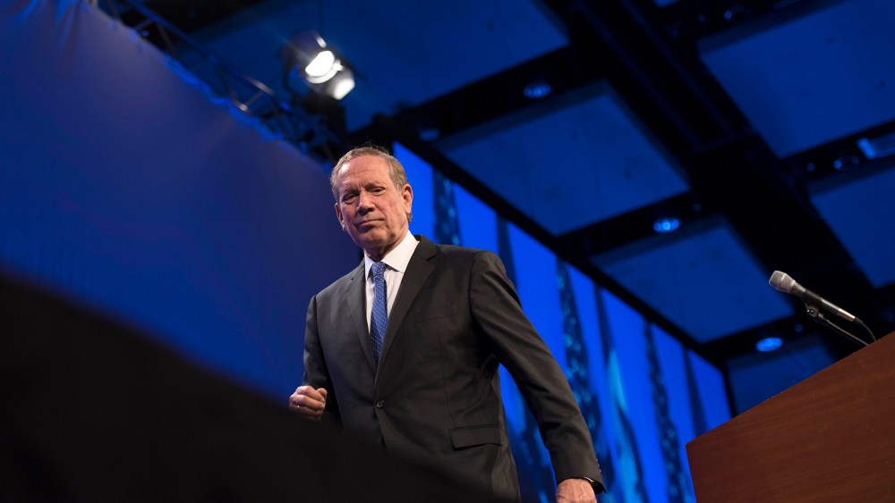 George Pataki, former governor of New York, leaves the stage after speaking during the Republican Party of Iowa's Lincoln Dinner in Des Moines, Iowa, May 16, 2015. (Photo by Daniel Acker/Bloomberg/Getty)