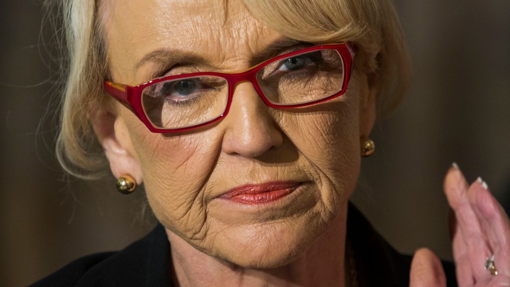Arizona Gov. Jan Brewer listens to US President Barack Obama speak to the National Governors Association in the State Dining Room of the White House Feb. 24, 2014 in Washington, DC.