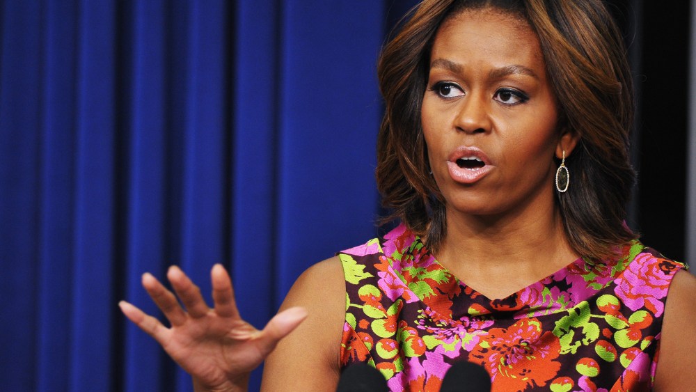 US First Lady Michelle Obama speaks in the Eisenhower Executive Office Building next to the White House in Washington, D.C., Feb. 24, 2014.