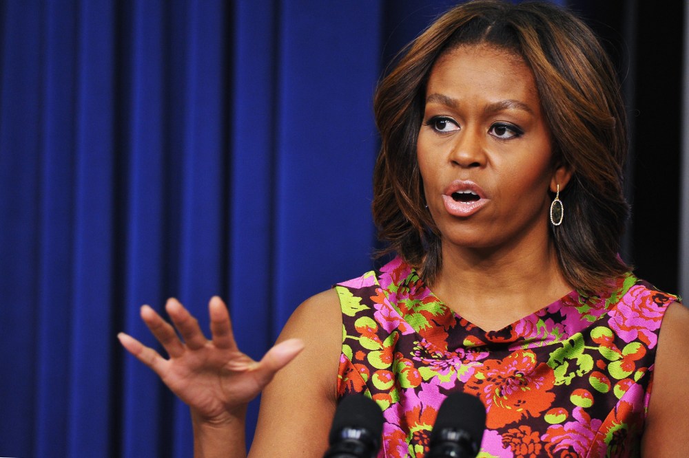 US First Lady Michelle Obama speaks in the Eisenhower Executive Office Building next to the White House in Washington, D.C., Feb. 24, 2014.