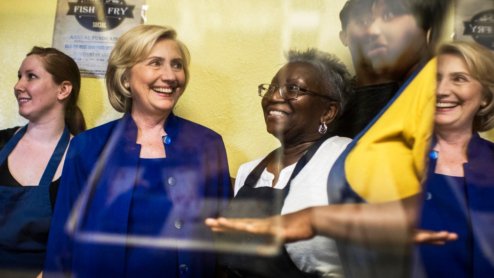 Former Secretary of State Hillary Clinton is shown the special treats at Main Street Bakery by owner Rosa Daniels, right, in Columbia, S.C. on May 27, 2015. (Photo by Melina Mara/The Washington Post/Getty)