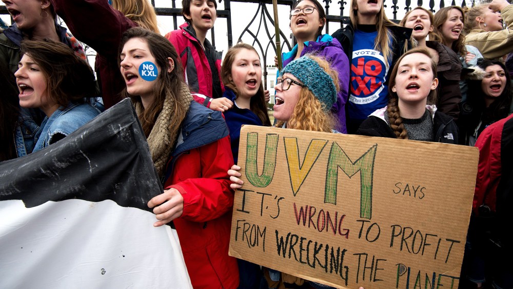 Students protesting against the proposed Keystone XL pipeline chant slogans in front of the White House, March 2, 2014 in Washington, DC.
