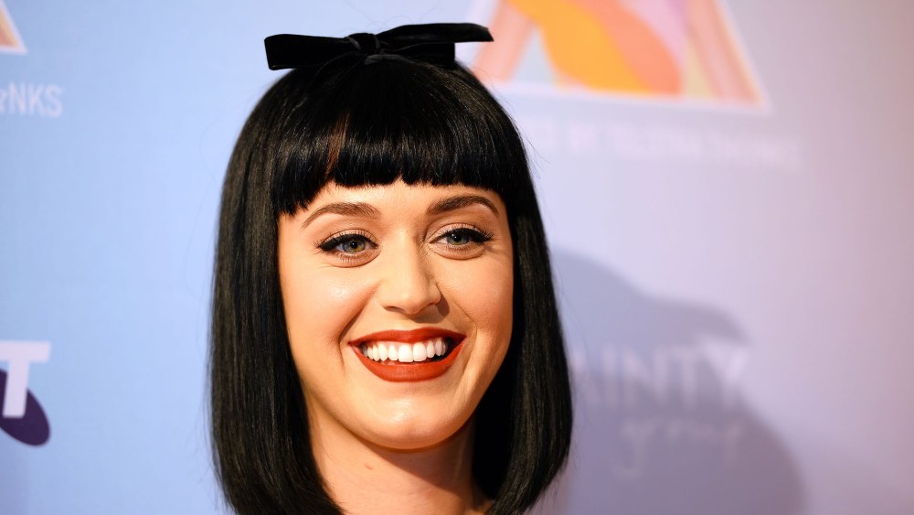 Katy Perry poses for photos at the launch of her Prismatic world tour in Sydney, March 4, 2014.