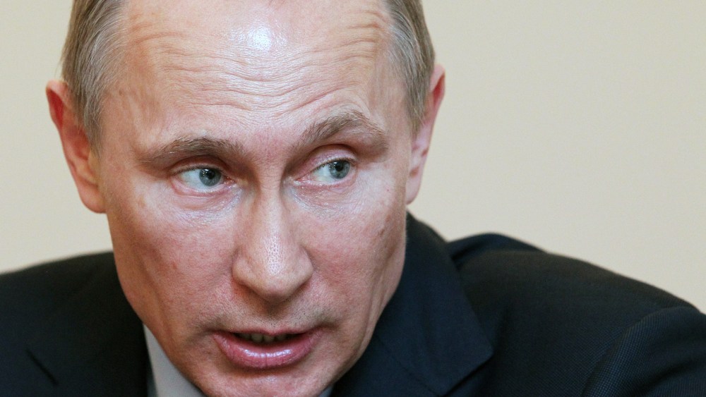 Russian President Vladimir Putin attends the Summit of Eurasian Economic Cooperation Council, March 5, 2014.