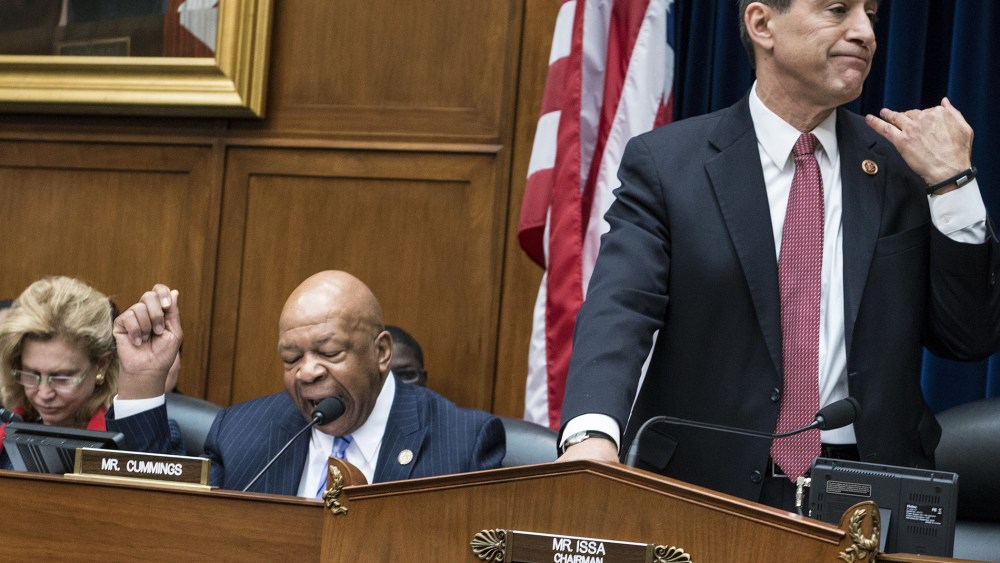 Committee chairman Rep. Darrell Issa (R-OH) (R) cuts ranking member Rep. Elijah Cummings (D-MD) off during a hearing of the House Oversight and Government Reform Committee on Capitol Hill on March 5, 2014 in Washington, DC.