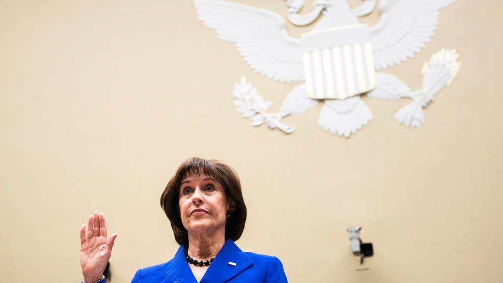 Lois Lerner is re-sworn-in for a continuation of a hearing of the House Oversight and Government Reform Committee on Capitol Hill March 5, 2014.