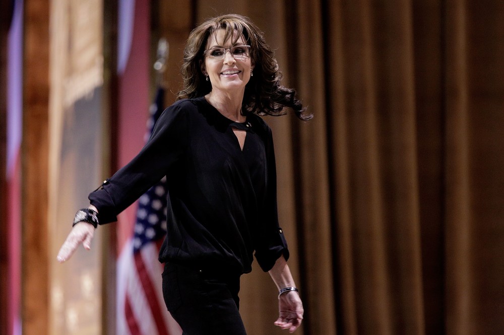 Sarah Palin waves as she leaves the stage during the 41st annual Conservative Political Action Conference on March 8, 2014 in National Harbor, Maryland.