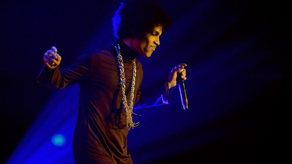 Prince performs onstage at The Hollywood Palladium on March 8, 2014 in Los Angeles, Calif. (Photo by Kevin Mazur/WireImage for NPG Records 2013/Getty)