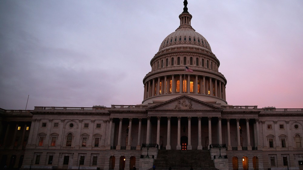 The American Flag flies over the Senate side of the U.S. Capitol, March 11, 2014 in Washington, D.C.