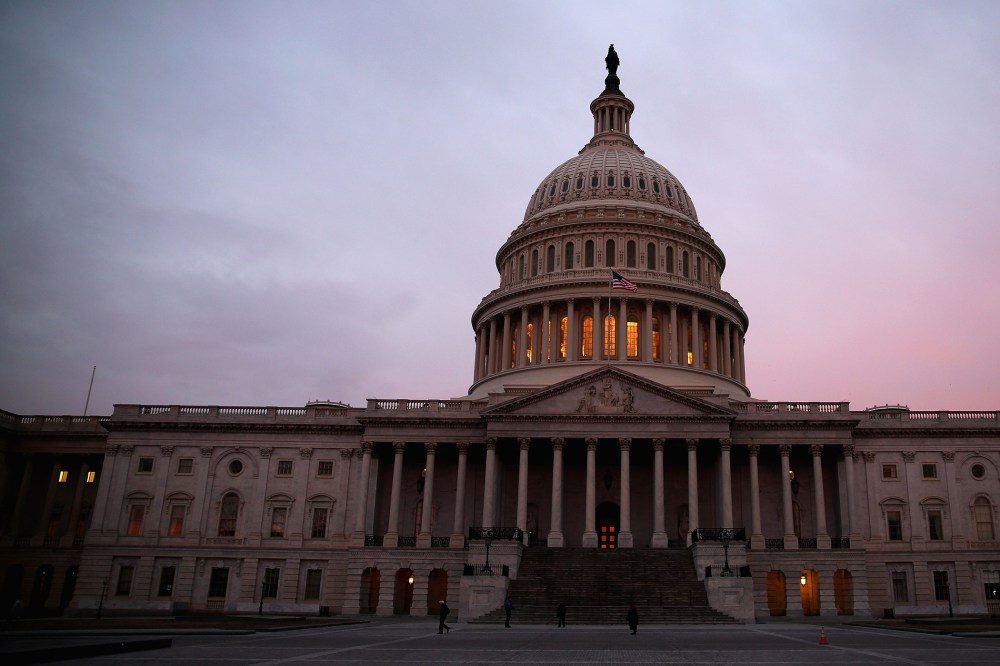 The American Flag flies over the Senate side of the U.S. Capitol, March 11, 2014 in Washington, D.C.