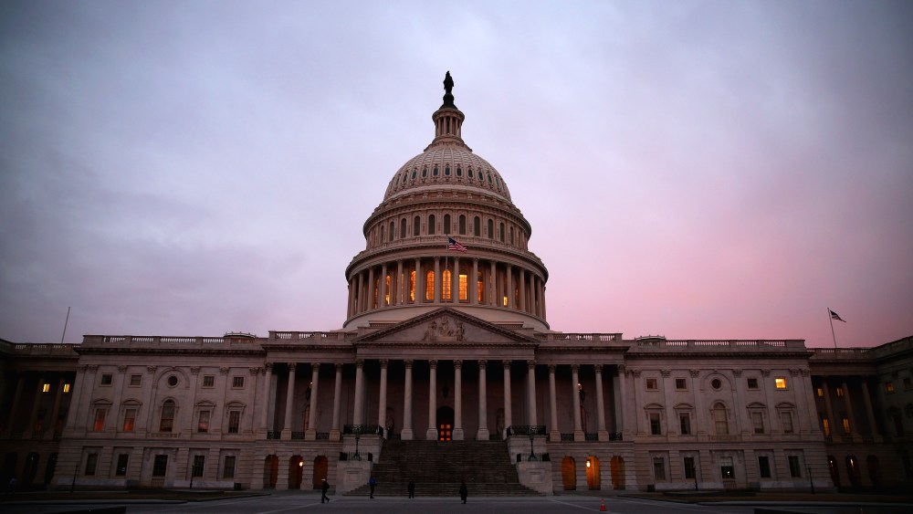 The American Flag flies over the Senate side of the U.S. Capitol, on March 11, 2014 in Washington, DC. (Photo by Mark Wilson/Getty)