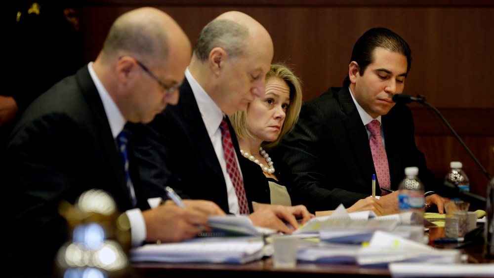 New Jersey Gov. Chris Christie's former Deputy Chief of Staff Bridget Anne Kelly sits with her attorneys in court while waiting for a hearing on March 11, 2014 in Trenton, NJ. (Photo by Mel Evans/Pool/Getty)