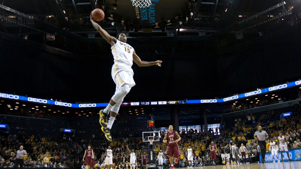 VCU Forward Juvonte Reddic dunks the ball against the St. Joseph's Hawks on March 16, 2014 at the Barclays Center in Brooklyn. N.Y.