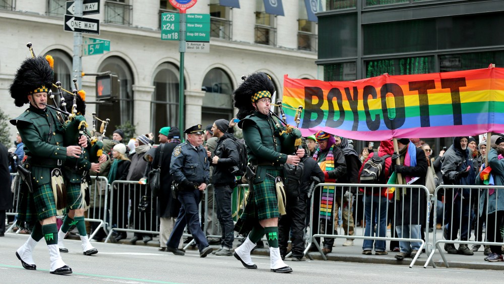 Thousands of people attend the 253rd annual St. Patrick's Day Parade along Fifth Avenue in New York City on March 17, 2014. Members of LGBT protest against the exclusion of their community from the parade. (Photo by Bilgin Sasmaz/Anadolu Agency/Getty)