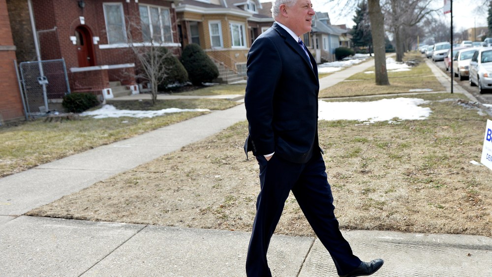 Illinois Governor Pat Quinn walks home after voting in the state's primary election on March 18, 2014 in Chicago, Ill. (Brian Kersey/Getty)
