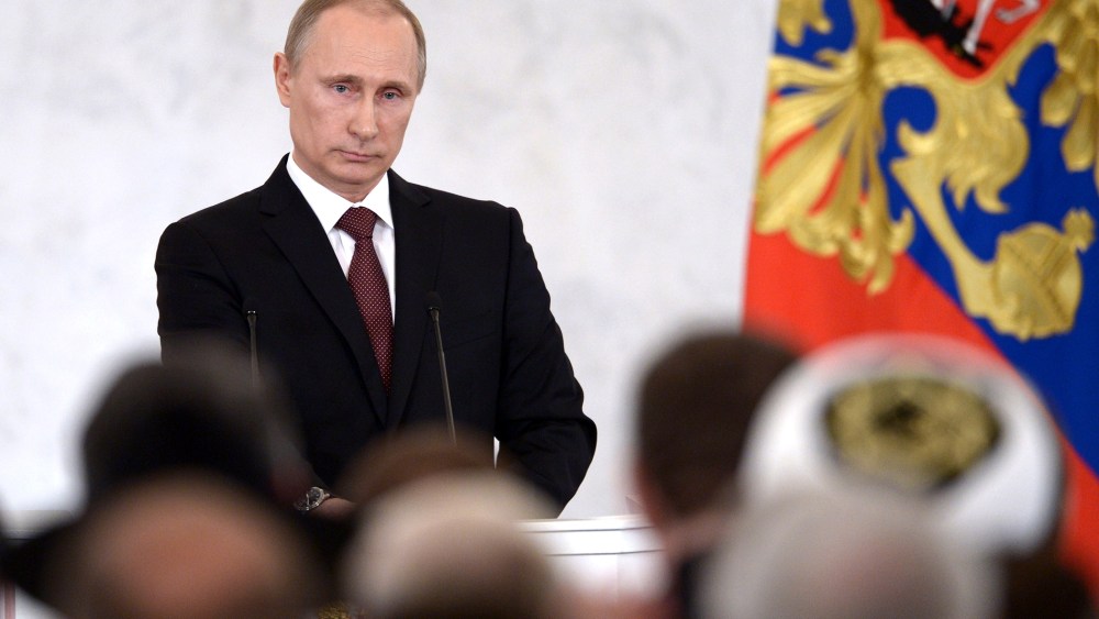 Russia's President Vladimir Putin addresses a joint session of Russian parliament on Crimea in the Kremlin in Moscow, on March 18, 2014