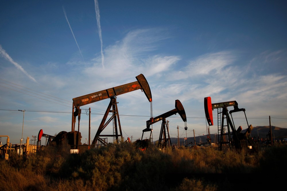 Pump jacks and wells are seen in an oil field where gas and oil extraction uses hydraulic fracturing, or fracking.