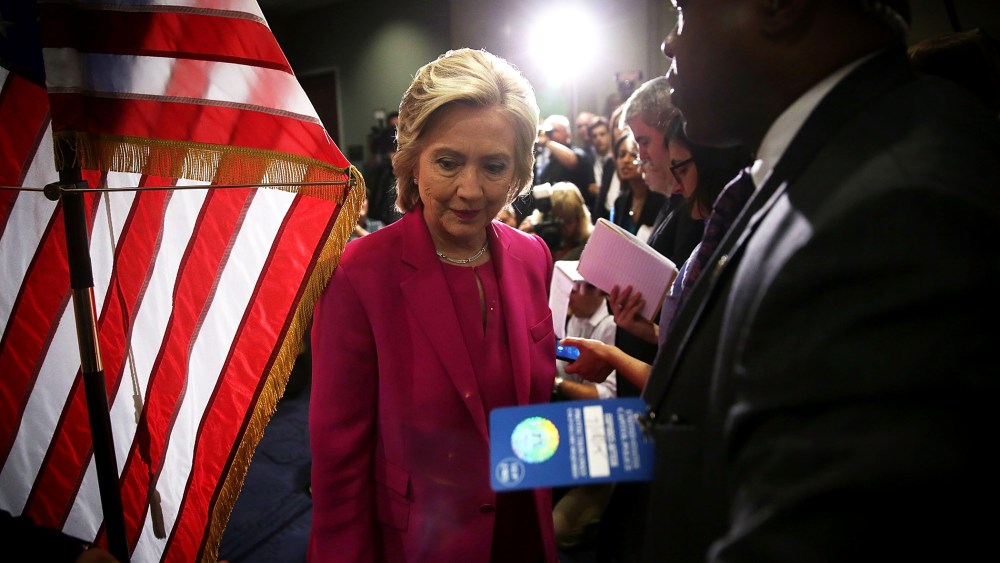 Democratic U.S. presidential hopeful and former U.S. Secretary of State Hillary Clinton leaves the podium after she spoke to members of the media July 14, 2015 on Capitol Hill in Washington, D.C. (Photo by Alex Wong/Getty)