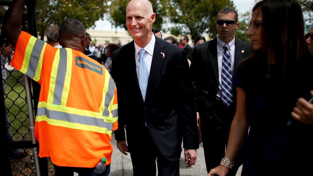 Florida Governor Rick Scott attends the ribbon cutting for the opening of a I-595 Express Project in Davie, Fla., Mar. 28, 2014.