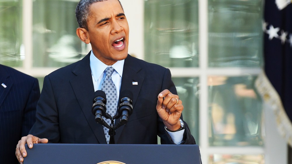 Obama delivers a statement on the Affordable Care Act at the Rose Garden of the White House in Washington, DC, on April 1, 2014.