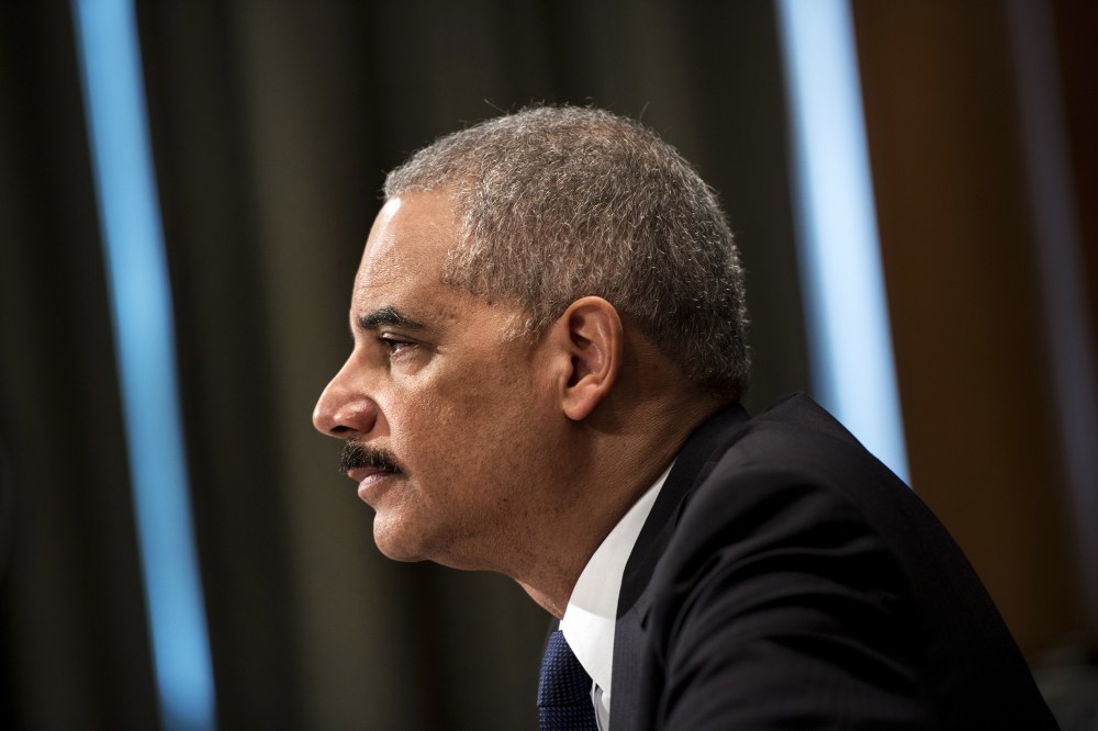 Attorney General Eric H. Holder listens during a hearing on Capitol Hill, April 3, 2014 in Washington, D.C.