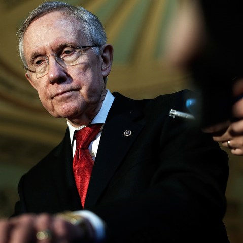 Harry Reid (D-NV) speaks with reporters following the weekly policy luncheon for Senate Democrats April 8, 2014.