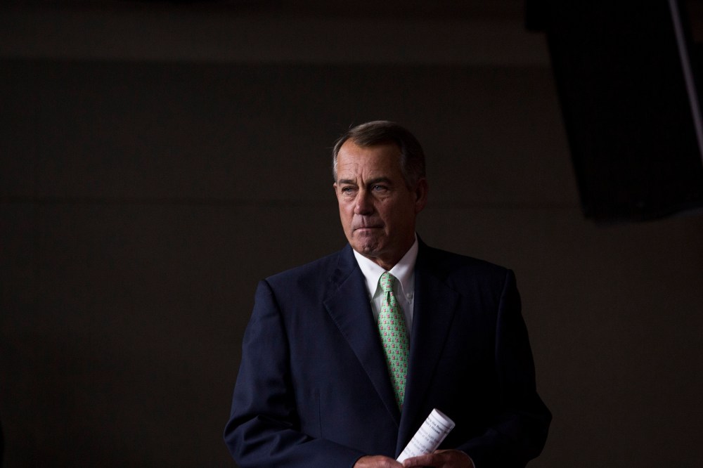 Speaker of the House John Boehner (R-OH) arrives for his weekly news conference on Capitol Hill, April 10, 2014.