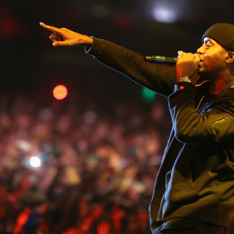Rapper Nas performs onstage during the 2014 Coachella Valley Music & Arts Festival at the Empire Polo Club on April 12, 2014.