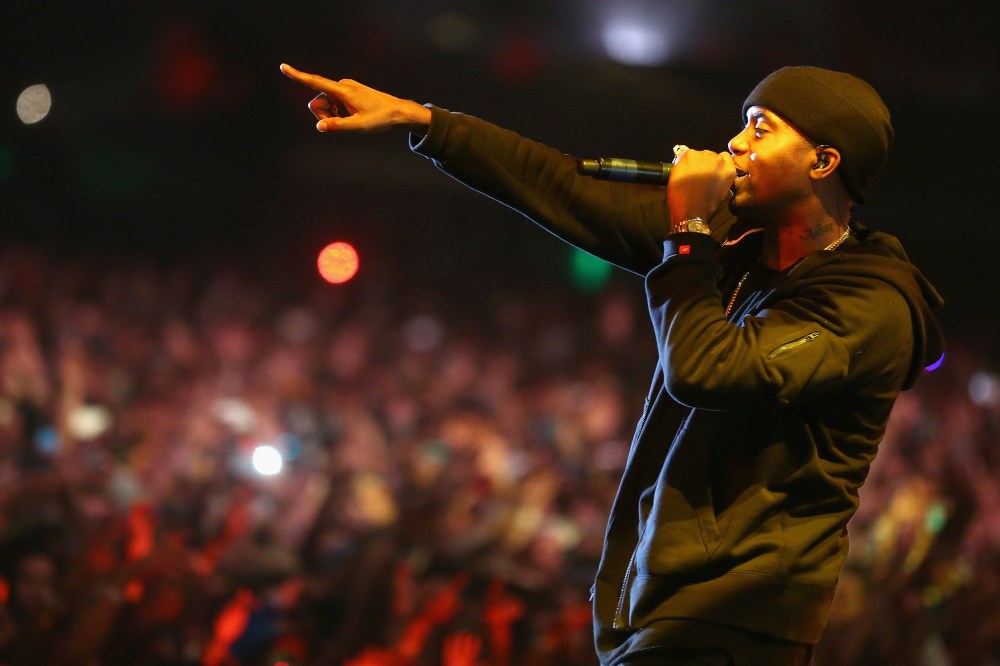 Rapper Nas performs onstage during the 2014 Coachella Valley Music & Arts Festival at the Empire Polo Club on April 12, 2014.